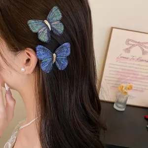 Detailed view of knitted butterfly hair clips on a woman's hair in a vintage style.
