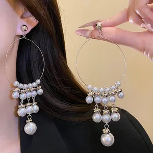 Elegant French vintage hoop earrings featuring cascading pearl tassels for a luxury look