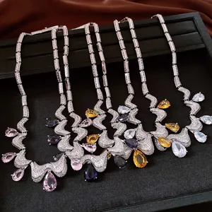 Detailed view of luxury French court style necklaces featuring colorful pear cut zircons
