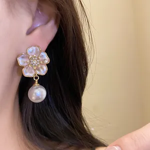 Elegant pink enamel flower earrings with dangling pearl and sparkling zircon center for women