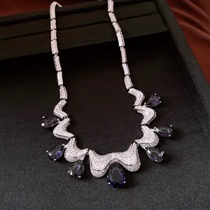 Detailed macro view of French vintage necklace with deep purple water drop zircons