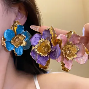 Elegant vintage palace style enamel flower stud earrings with gold metallic centers