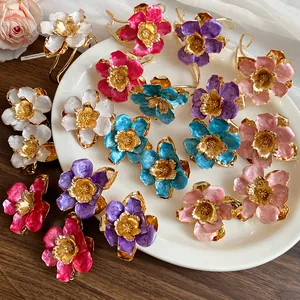 Multi-color vintage style metal flower earrings with a detailed oil drip finish
