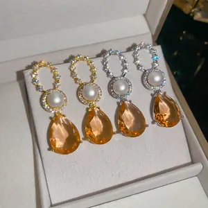 Elegante 18 Karat vergoldete Zirkon-Perlenohrringe mit champagnerfarbenen Edelsteinen