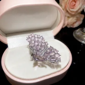 Exquisite butterfly open ring with pink micro-pave stones in a luxury pink ring box