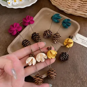 Elegant summer floral drop earrings with pinecone tassels, handmade bohemian forest style jewelry