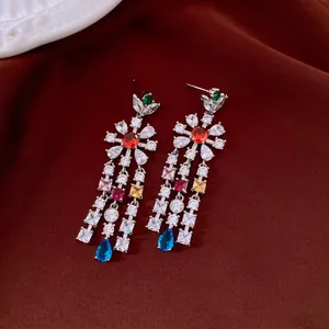 Detailed view of vintage-style multi-color zircon flower tassel earrings