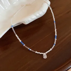 Elegant crystal pearl beaded necklace with a clear sugar cube pendant for women