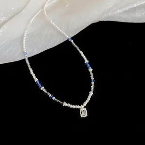 Elegant white pearl and blue crystal beaded necklace with square crystal pendant