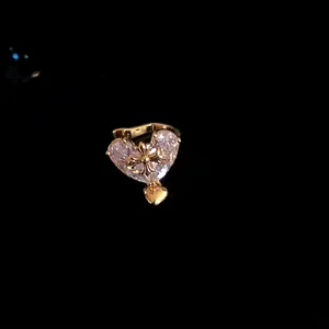 Elegant heart-shaped zircon ear clips with golden cross detail for non-pierced ears