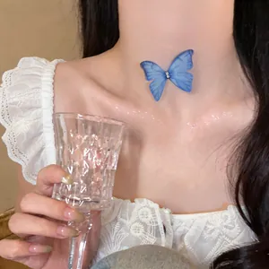 Detailed view of an elegant blue organza butterfly choker necklace with rhinestones