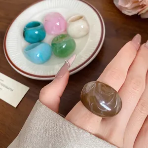 Chunky resin marbled ring with elegant swirl pattern, fashion statement jewelry for women