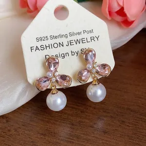 Elegant 18k gold plated flower stud earrings with pink crystals and round pearls