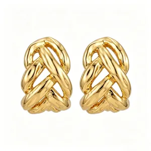Statement gold-tone C-shape chain link knot stud earrings with minimalist luxury design.
