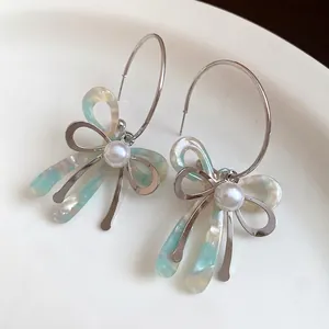 Süße bunte Schleifenohrringe mit Perlenanhänger und Silbernadeln Modeschmuck