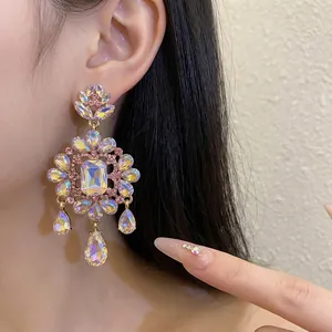 Vintage floral teardrop dangle earrings with iridescent rhinestones for women, gold-tone style