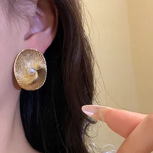 Elegant 18k gold plated oval textured pearl stud earrings for women