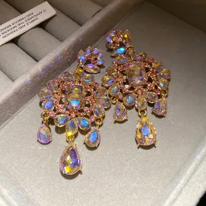 Vintage gold-tone chandelier earrings with iridescent AB crystals in flower and drop shapes
