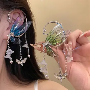 Forest style resin wing drop earrings with delicate flower and butterfly charms details