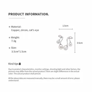 Product info of silver needle earrings with cat's eye stones and zircon specs.