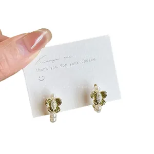 Elegant French style green enamel floral stud earrings with delicate white pearls