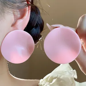 Elegant pink acrylic round wavy stud earrings with silver needles for a stylish look