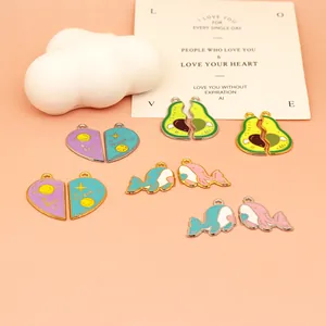 Detail showing colorful enamel DIY charms in heart, avocado, and whale shapes