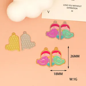 Detail view of colorful heart-shaped bird enamel charms with 26x18mm dimensions
