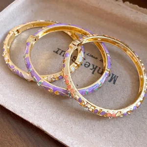 Vintage gold-plated enamel floral bangle bracelet with rhinestones for elegant women