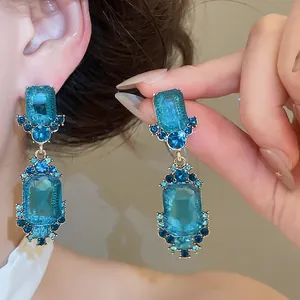 Elegant vintage court style geometric blue crystal drop earrings with faceted stones
