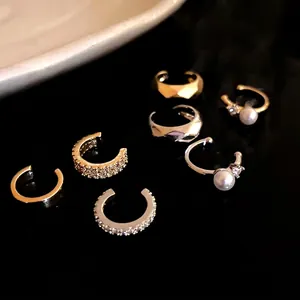 Set of minimalist zircon ear cuffs and non-piercing pearl earrings