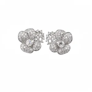 Elegant silver-tone flower stud earrings with zircon crystals and sparkling floral design