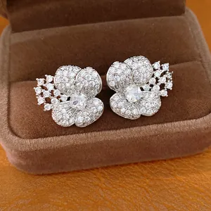 Elegant silver needle flower stud earrings with sparkling clear cubic zirconia stones
