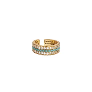 Vintage gold-plated open ring featuring sparkling cubic zirconia and turquoise stones