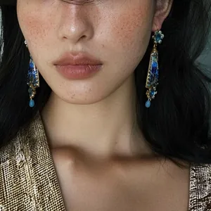 Vintage resin flower drop earrings with a luxurious antique court style jewelry design