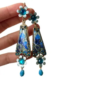 Vintage palace style earrings with blue resin flowers and sparkling crystals