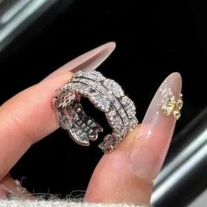 Close-up of elegant silver-toned ring featuring multiple rows of sparkling zirconia