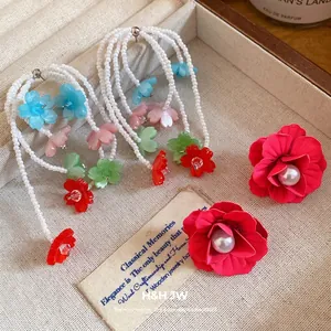 Resort style floral pearl stud earrings and colorful beaded drop earrings jewelry set