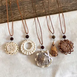 Handmade natural woven rattan pendant necklaces with leather cords in bohemian style