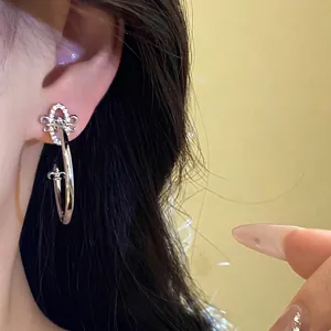 Elegant Fleur-de-lis C-shaped zircon stud earrings with silver needle for modern women