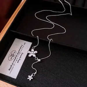 Silver minimalist flower tassel necklace for women, elegant ins-style jewelry display