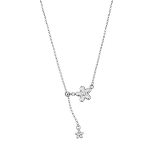 Minimalist silver flower tassel necklace for women, stylish clavicle chain accessory.