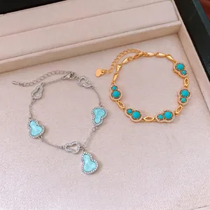 Exquisite 18k gold plated gourd charm bracelet with sparkling zircons and turquoise stones