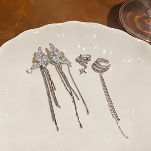 Silver tassel ear cuff set with zirconia butterflies and stars on decorative plate