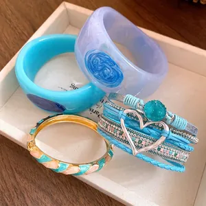 Set of stylish resin bangles and enameled heart charm multi-layer leather bracelet