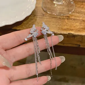 Elegant silver ear clips with sparkling zircon butterfly and long chain tassels detail