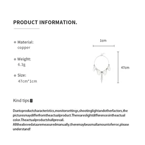 Fiche d'information détaillée pour un collier à pampilles en dentelle minimaliste en cuivre