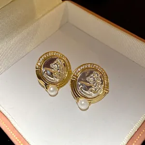 Boucles d'oreilles vintage tête de cheval avec perles élégantes et zircons brillants