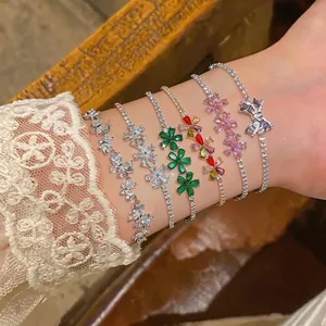 Elegant 18k gold plated bracelets with flower zircon charms on a wrist