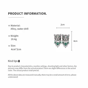 Vintage leopard earrings with green water drill stones in silver-tone alloy